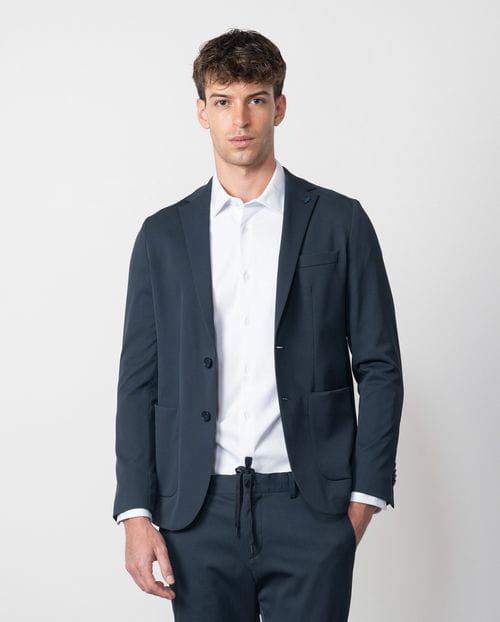 Etiem Americana desestructurada sin forro slim fit en tejido técnico elástico Devoluciones gratuitas