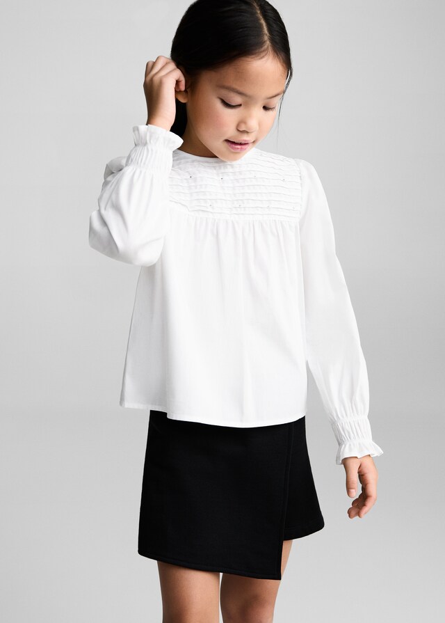 mango Blusa plisada strass