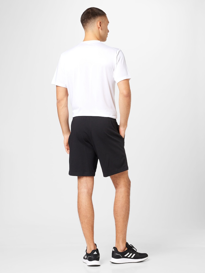 sinned x about you regular Pantalón deportivo 'Essentials' ADIDAS SPORTSWEAR en Negro Envío gratis