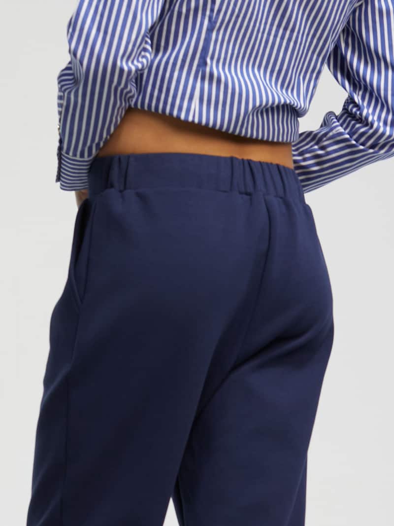 sinned x about you regular Pantalón Lola Casademunt en Navy Liquidación