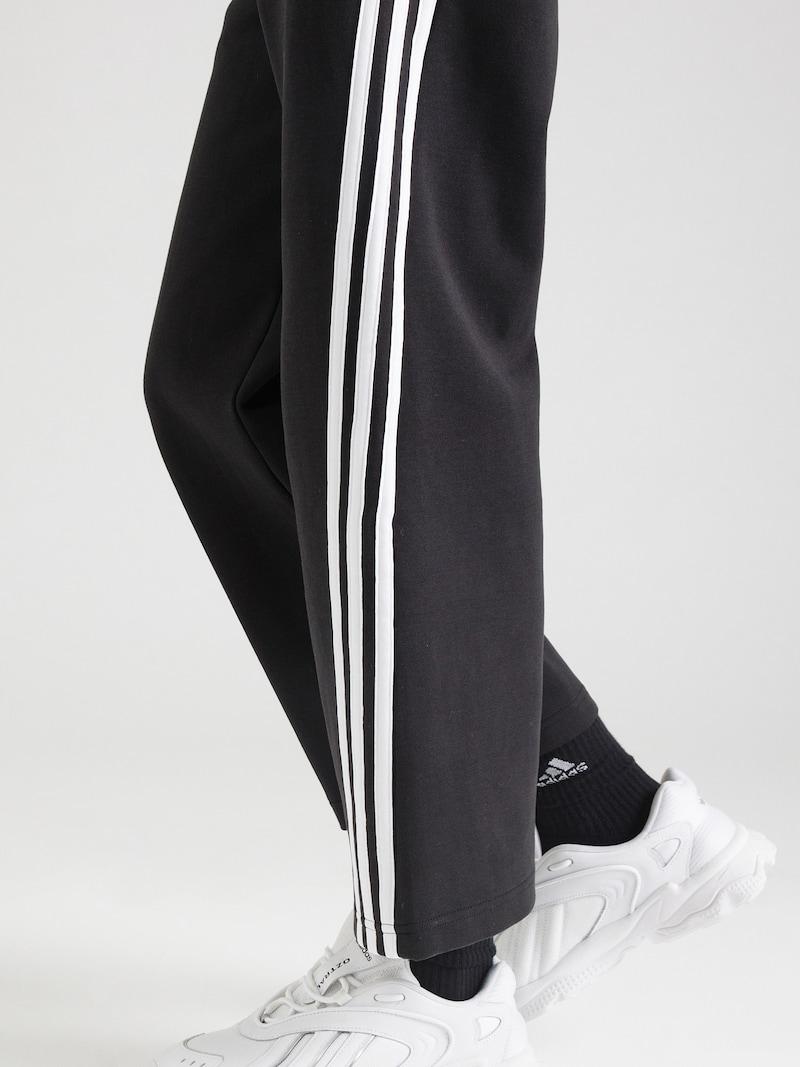 sinned x about you Loosefit Pantalón deportivo 'Future Icons' ADIDAS SPORTSWEAR en Negro Oferta especial de fábrica