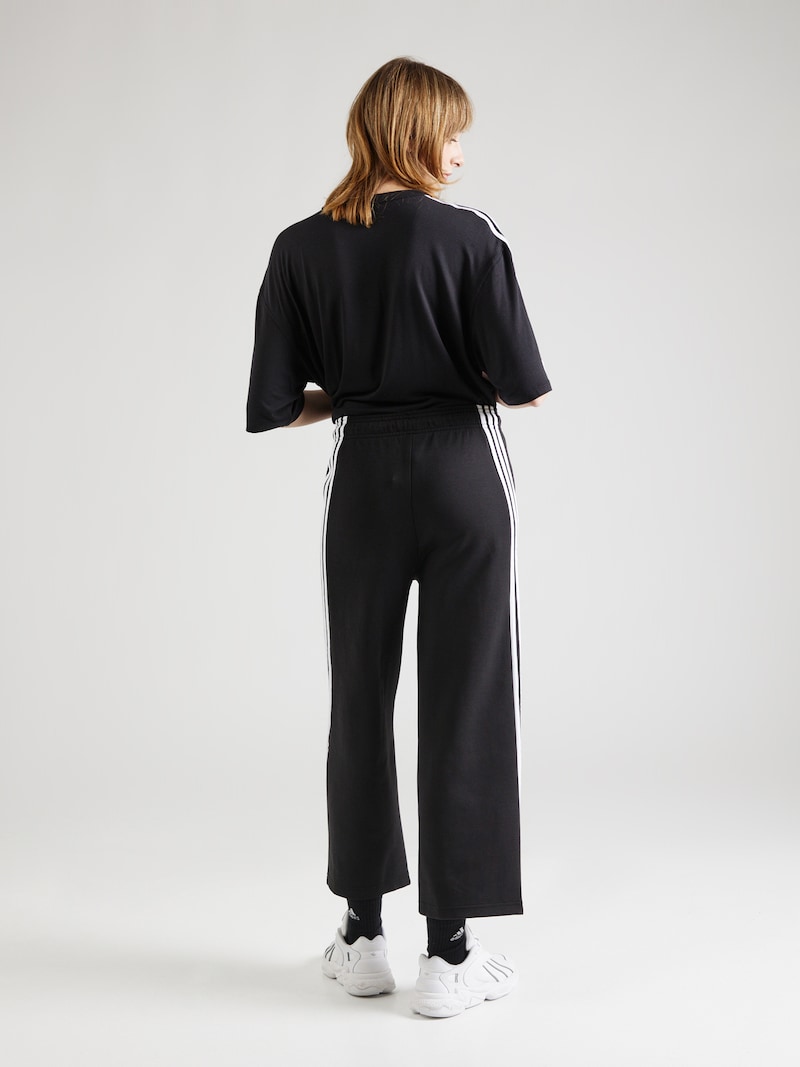 sinned x about you Loosefit Pantalón deportivo 'Future Icons' ADIDAS SPORTSWEAR en Negro Oferta especial de fábrica