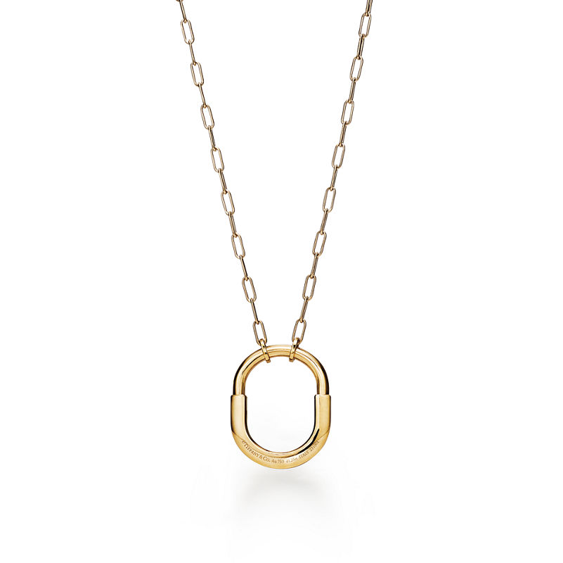 Tiffany & Co. Tiffany Lock Colgante en oro amarillo con diamantes en pavé tamaño mediano Oferta exclusiva