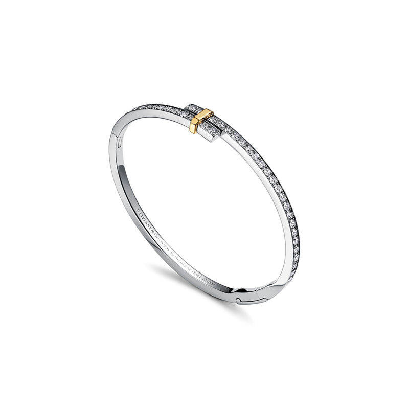 Tiffany & Co. Tiffany Edge Brazalete Hinged Bypass en platino y oro amarillo con diamantes Ahorra y exporta