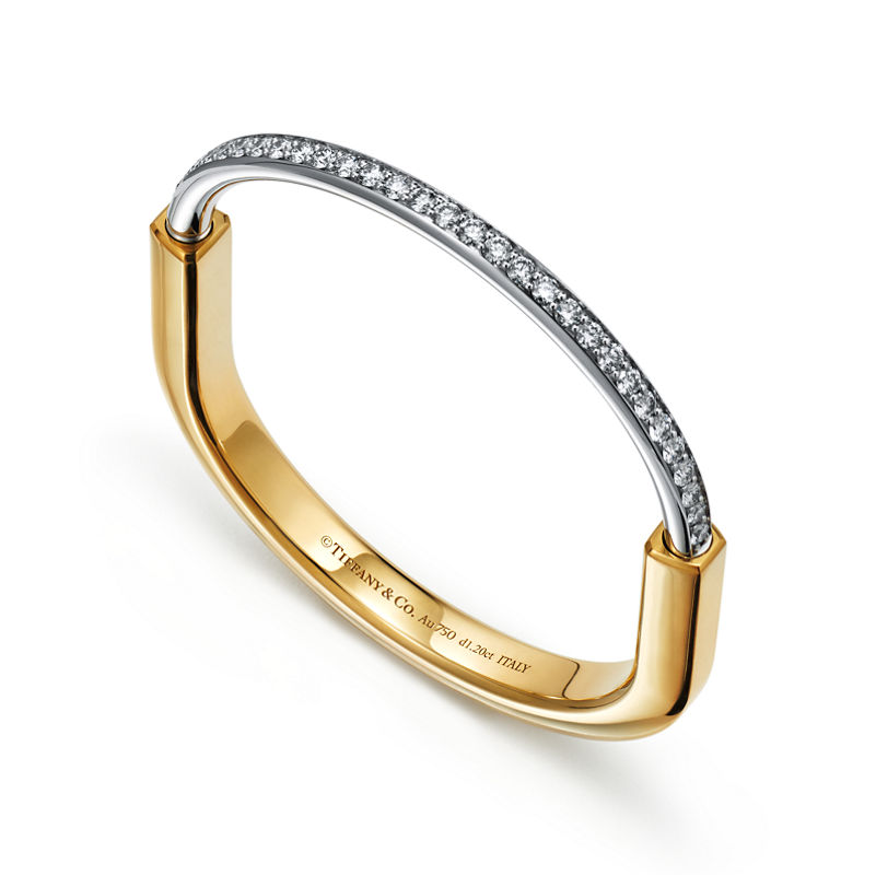 Tiffany & Co. Tiffany Lock Brazalete en oro amarillo y blanco con medio pavé de diamantes En oferta